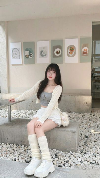 Woman relaxing in a cafe lounge before a random voice chat